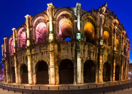 Night view of colorful illuminated Arena of Nimes, Franceの写真素材