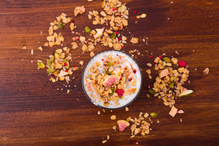 Oatmeal with dried fruit and milkの写真素材