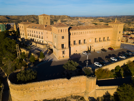Aerial view of impressive medieval castle of Order of Calatrava on hill in town of Alcaniz, Spainのeditorial素材