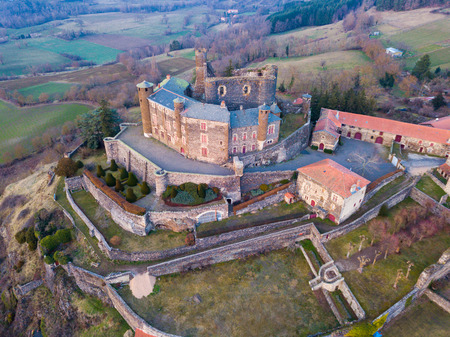 Picturesque autumn landscape with imposing medieval Bouzols Castle in French commune of Arsac-en-Velay, Haute-Loireのeditorial素材