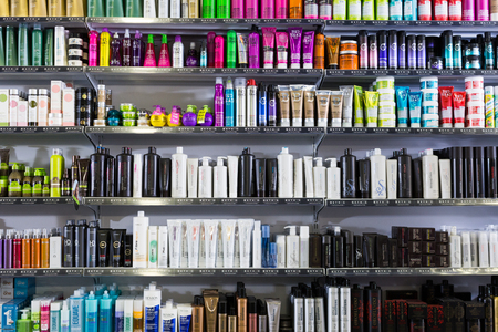 BARCELONA, SPAIN - MARCH 31, 2018: Shelves with different hair care products in a cosmetics storeのeditorial素材