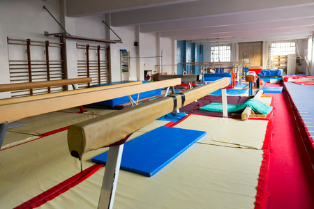 New acrobatic with gymnastic equipment â balance beams, bars and pommel horseの写真素材