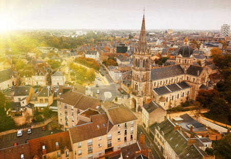 Aerial view of ancient Church Notre-Dame in French commune of Chateauroux on background with...