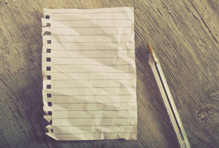 Crumpled sheet notebook line with ballpoint pen