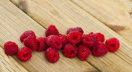 Fresh ripe red raspberry berries closeup