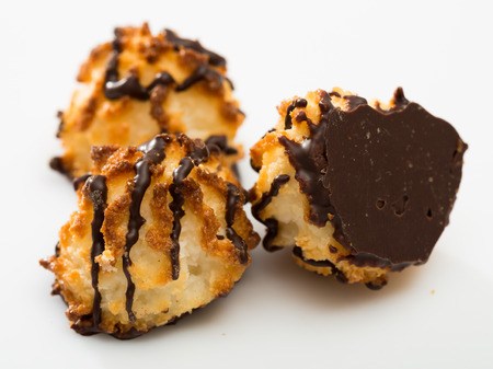 Tasty dessert, coconut cookies with chocolate glazeの写真素材