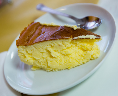 Slice of easy and tasty Tarta de queso cheesecake. Homemade bakingの写真素材