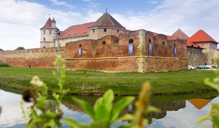 Castle on the lake is landmark of Fagaras in Romania.の写真素材