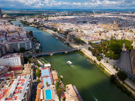 Aerial panoramic view of modern cityscape of Seville with Guadalquivir river, Spainの写真素材