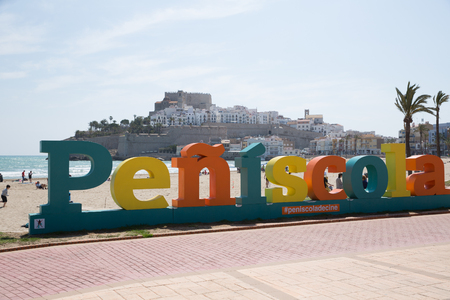 PENISCOLA, SPAIN - APRIL 16, 2019: Symbolic sculpture of city name of Peniscola, popular tourist destination at Mediterranean coast, Spainのeditorial素材