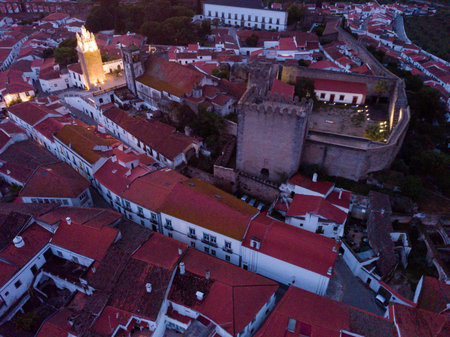 Aerial night view of historical center of Sepra, Portugal