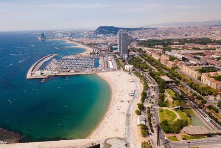 Shoreline of Barcelona is colorful landmark of Spain outdoors.の写真素材