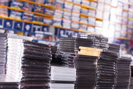 BARCELONA, SPAIN - FEBRUARY 15, 2018: Large collection of movies on DVD for sale on piles at shopのeditorial素材