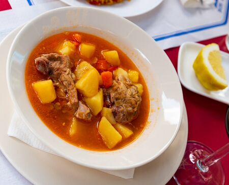Delicious lamb soup with potatoes. Traditional oriental dishの写真素材