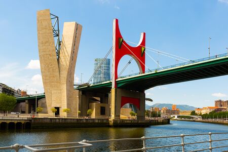 BILBAO, SPAIN - JULY 16, 2019: View of modern bridge Puente de La Salve over Nervion riverのeditorial素材