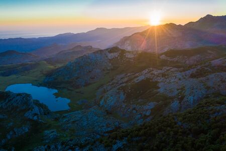 Mountain lake at sunset in Picos de Europa Natural Park. Spainの写真素材