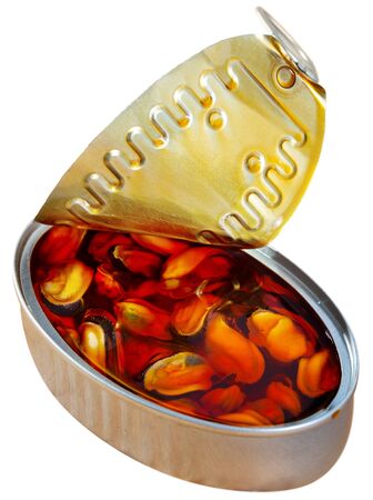 Tasty  sea pickled mussels in open tin can, nobody. Isolated over white backgroundの写真素材