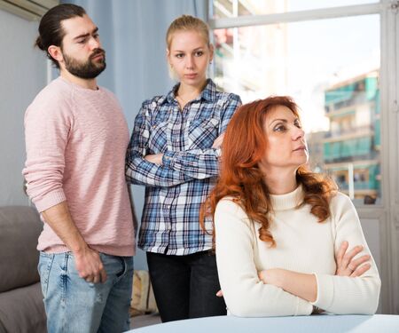 The son-in-law makes claims to the mother-in-lawの写真素材