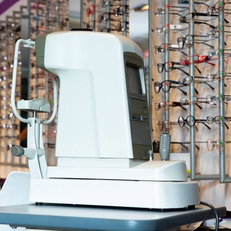 Closeup of modern auto refractometer in optical store. Technologies in eye diagnostic medicineの写真素材
