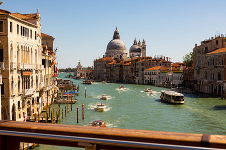 VENICE, ITALY - SEPTEMBER 05, 2019: Picturesque view of Grand canal with boats, ancient buildings on...