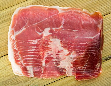 Appetizing slices of jamon or traditional spanish panceta curadaの写真素材