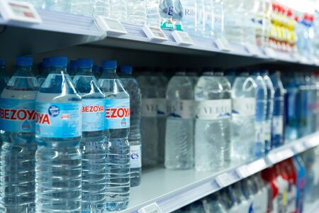 Barcelona, Spain - November 7, 2019: Drinking water bottles on store shelvesのeditorial素材