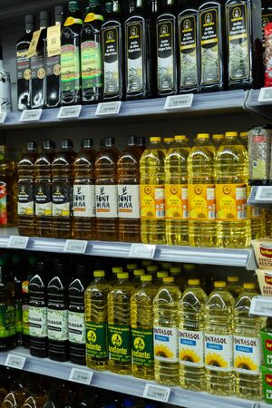 BARCELONA, SPAIN - NOVEMBER 7, 2019: Variety of olive oil on rack in supermarketのeditorial素材