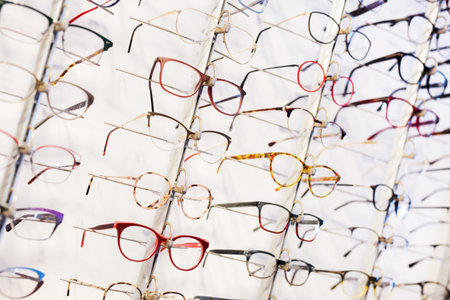 Image of a glasses showcase at a modern optic shop, nobody