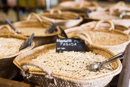 Closeup view on fabada beans in baskets selling on shopの写真素材