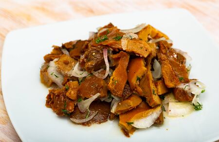 Pickled mushrooms with onions and dillの写真素材