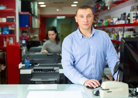 Portrait of a copy shop administrator