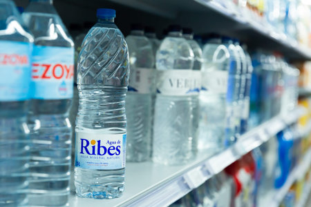 Barcelona, Spain - November 7, 2019: Drinking water bottles on store shelves
