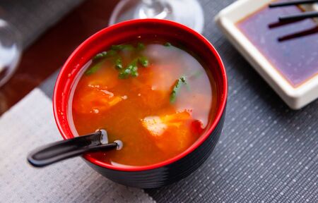 Spicy tomato soup in red bowl, japanese cuisineの写真素材