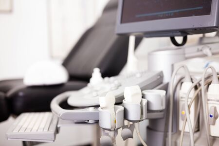 Modern medical equipment, medical ultrasound machine with probes in clinic diagnostic roomの写真素材