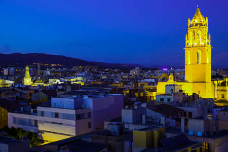 Picturesque cathedral in city center of Reus in eveningのeditorial素材