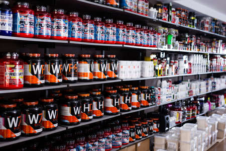 BARCELONA, SPAIN - SEPTEMBER 20, 2019: Diversity of food supplements in sport nutrition storeのeditorial素材