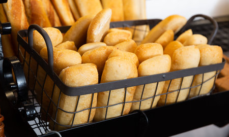 Delicious and fresh bread products lying on counter in bakery