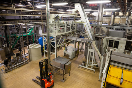 Interior and equipment of modern beer bottling lines at brewery