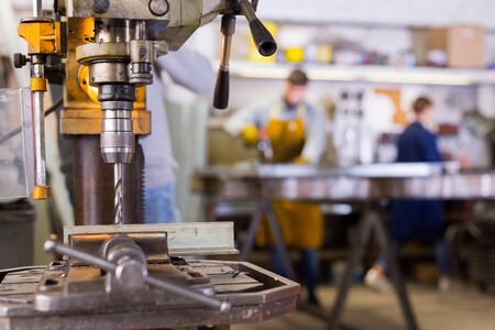 Workshop of industrial manufacture with drill machine, nobodyの写真素材