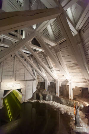 WIELICZKA, POLAND - MARCH 11, 2020: Jozef Pilsudski Chamber flooded by salt lake overlooking sculpture of St. John Nepomuk. Interiors of Wieliczka salt mineのeditorial素材