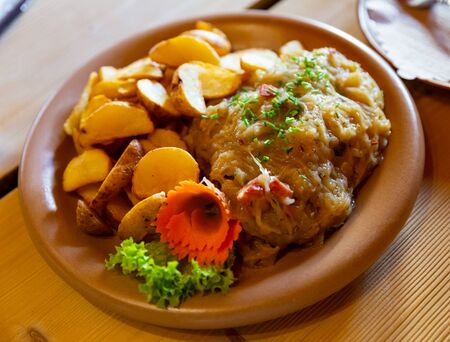 Pork ribs with stewed cabbage and potatoes - Polish dishの写真素材