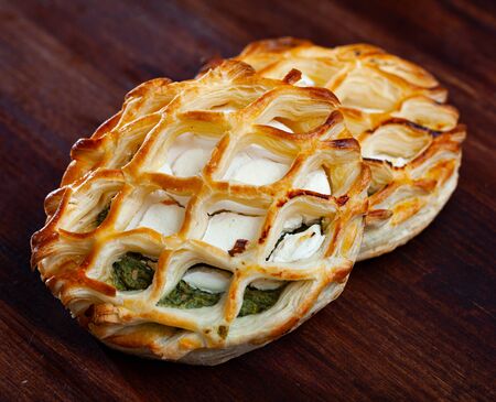 Delicious puff pastry stuffed with goat cheese and spinachの写真素材
