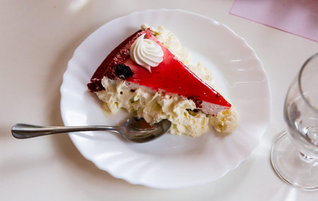 Homemade  cake dessert with berries jelly and cream  at plate, nobody