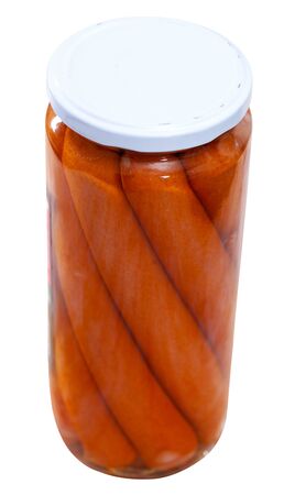 Tinned sausages in glass jar on a wooden tableï»¿. Isolated over white backgroundの写真素材