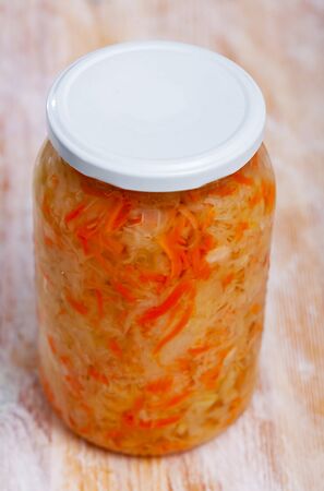 Homemade sauerkraut in glass preserving jar, fermented foodの写真素材