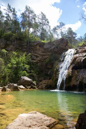 Waterfall in Catalonia surrounded by beautiful forests and valleysの写真素材