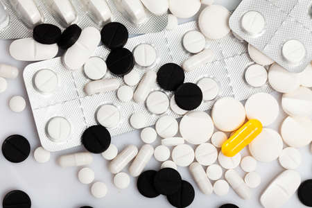 Tablets and capsules pills on white backgroundの写真素材