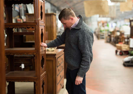 Portrait of male buyer in furniture storeの写真素材