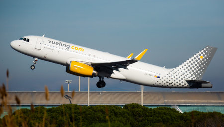 Vueling airliner EC-MEQ taking off from El Prat Airport