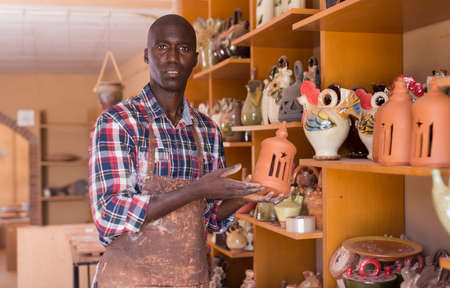 Craftsman offering ceramic productsの写真素材